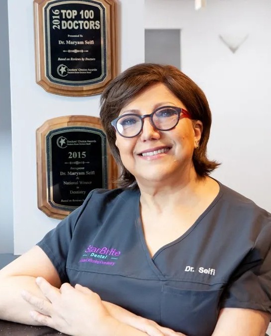Dr. Maryam Seifi with her Doctors' Choice awards at StarBrite Dental
