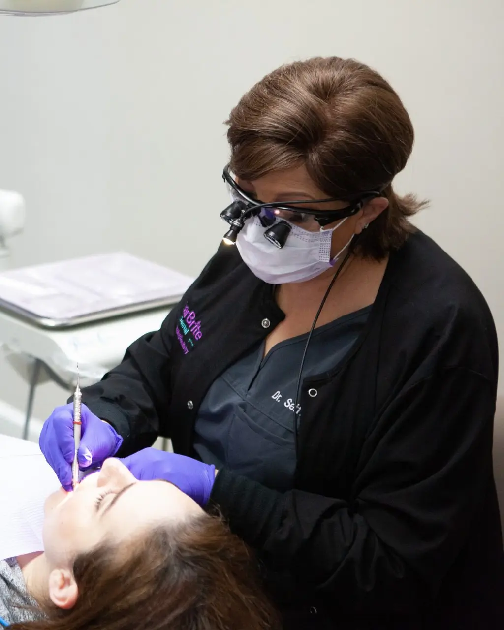 Dr. Maryam Seifi providing cosmetic dental care to a patient